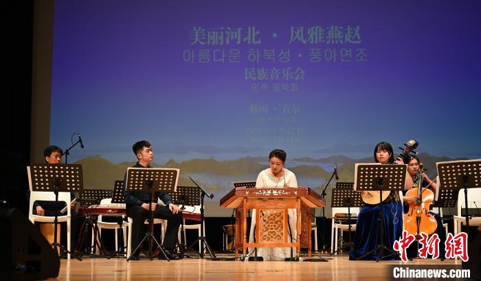 圖為音樂會現(xiàn)場?！∈谞栔袊幕行墓﹫D