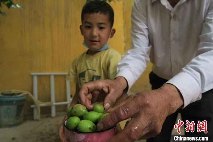 圖為進(jìn)藏先遣英雄連誓師地原址所在的新疆維吾爾自治區(qū)和田地區(qū)于田縣普魯村現(xiàn)貌?！畛坛?攝