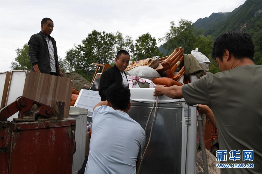 （新華全媒+）（9）千里“挪窩”，踏實(shí)開啟新生活