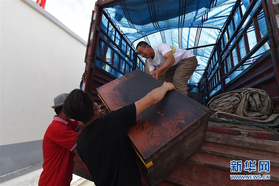 （新華全媒+）（26）千里“挪窩”，踏實(shí)開啟新生活