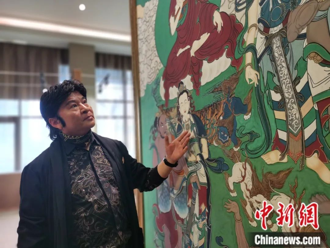 國家一級美術(shù)師劉觖。張?zhí)砀?攝