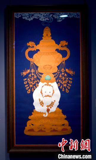 圖為5月16日，展覽中的新創(chuàng)唐卡作品《瑞象承香》?！±盍?攝